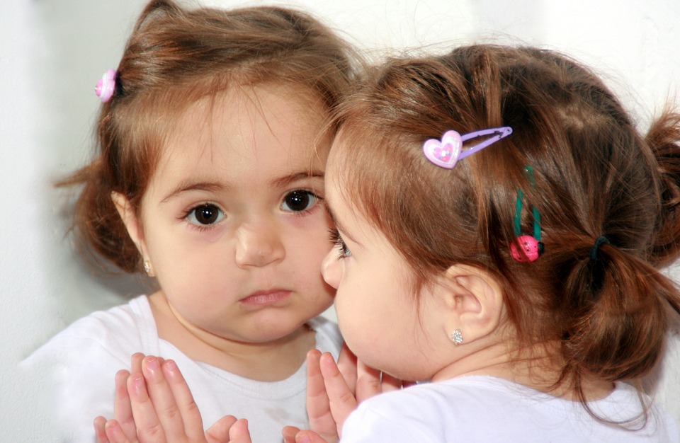 child in mirror