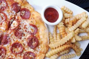 pepperoni pizza with french fries and catch-up