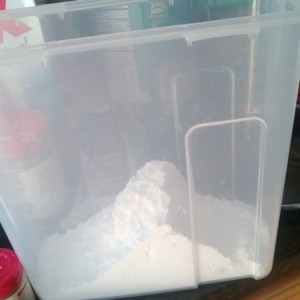 Empty all of the powdered sugar.
