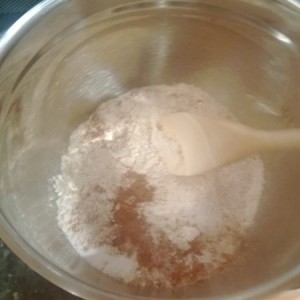 Combine the remaining dry ingredients in a bowl -- flour, baking soda, salt, spices.