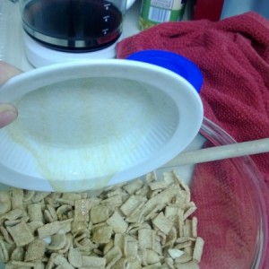 Pour butter mixture over cereal mixture.