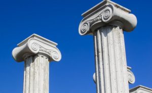 ancient pillars against a blue sky