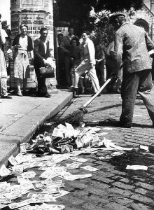 Sweeping up banknotes during hyperinflation in Germany