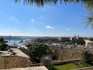 View of road, buildings, and riverway of Valletta, Malta