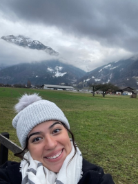Jocelin in Switzerland with mountains in background