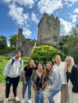 Giselle and friends posing outside Irish Castle