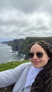 Giselle posing in front of Cliffs of Moher
