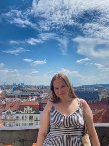 Abi on balcony overlooking the city of Prague.