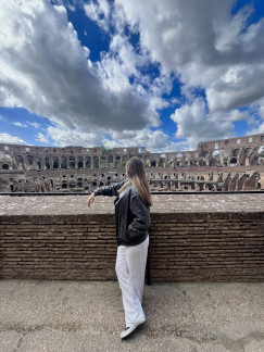 Belle Echeverria looking into Roman Colosseum 
