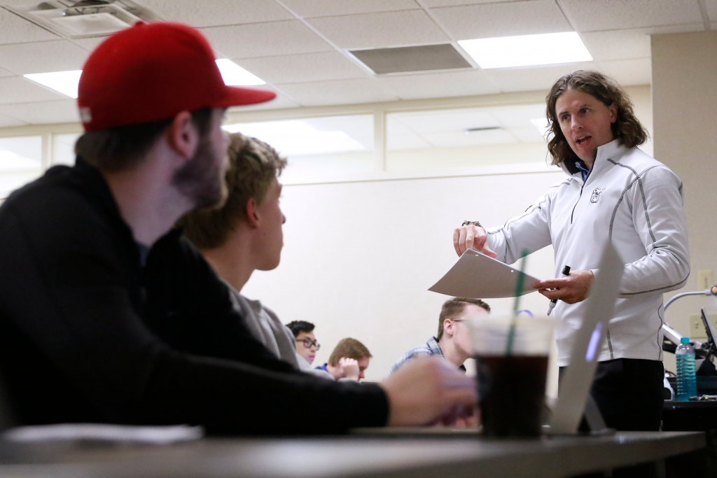 Bryan Foltice teaching in class.